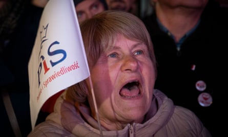 Older woman with PiS flag and mouth open