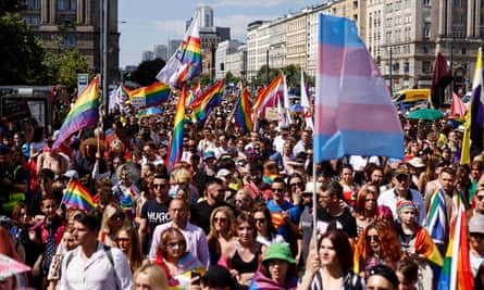 People attend a WarsawPride and KyivPride march in Warsaw, Poland on 25 June 2022.