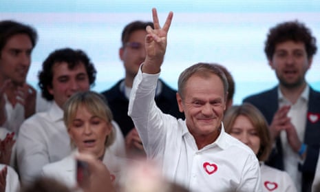 Donald Tusk, leader of the largest opposition grouping Civic Coalition (KO), gestures after the exit poll results are announced in Warsaw, Poland, in October 2023