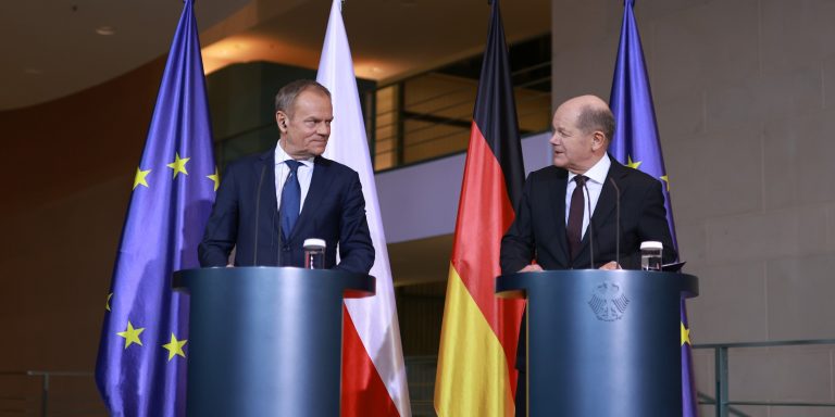 Tusk calls for EU to become “military power” on Paris and Berlin visits