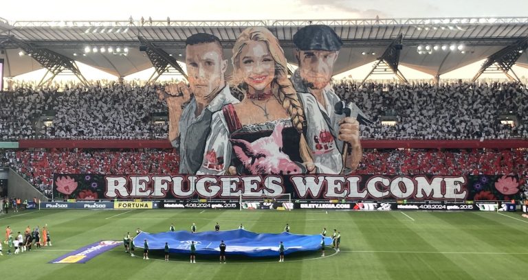 UN refugee agency criticises Warsaw football fans’ banner