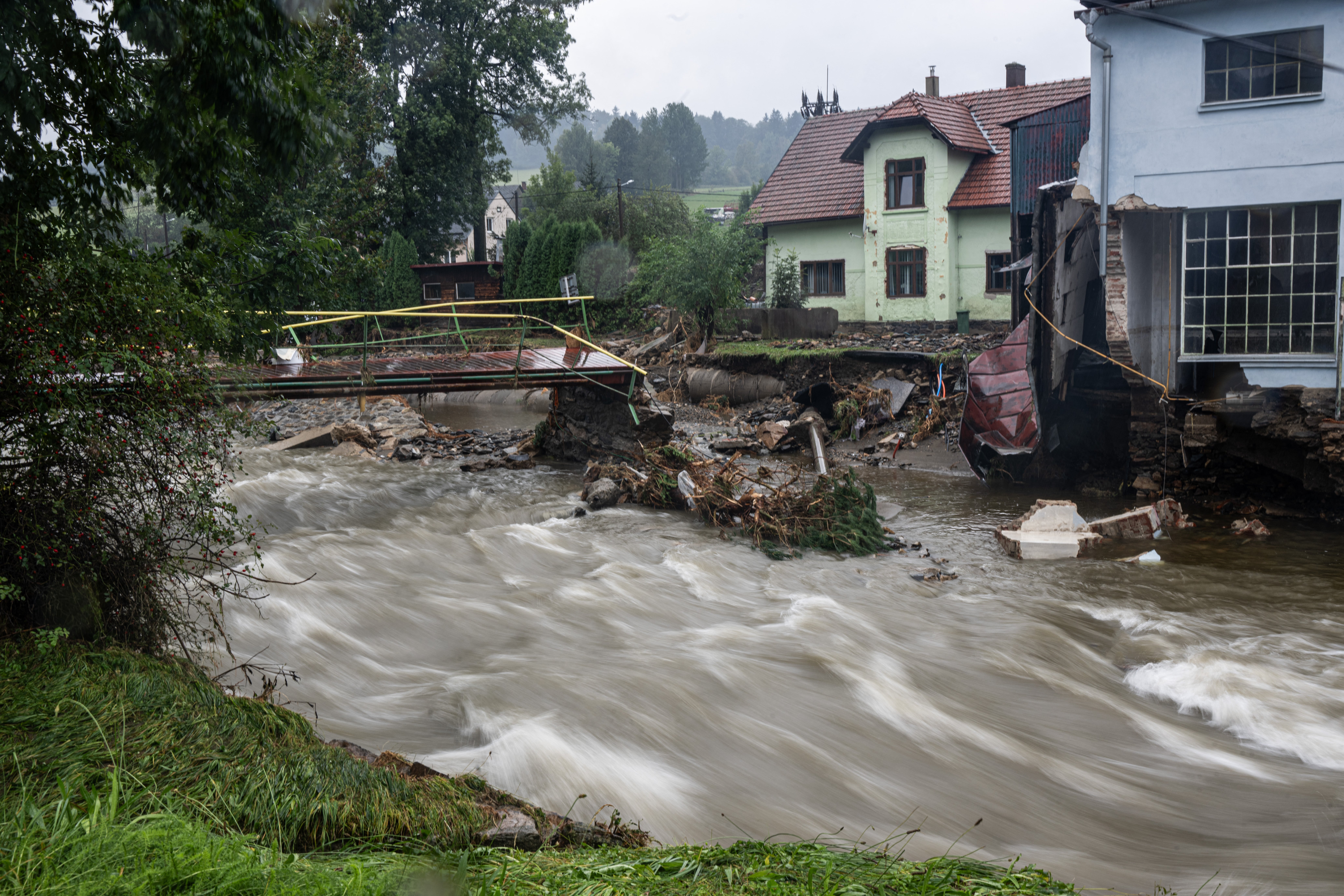 This photo taken on September 16, 2024 in Bela pod Pradedem shows damages caused by the floods of the swollen Bela brook.