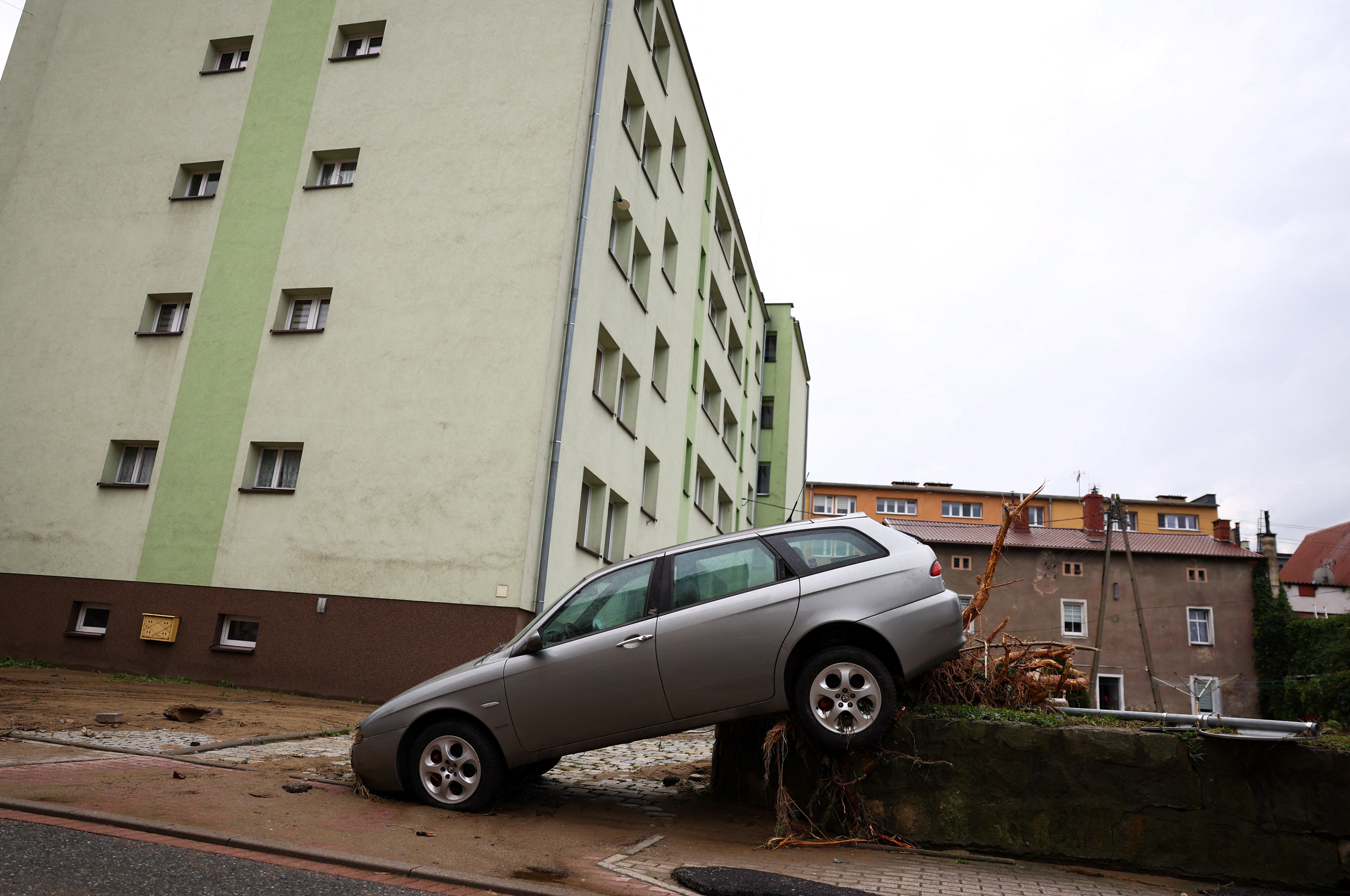 A view shows a destroyed car in the aftermath of flooding by the Biala Ladecka River in Ladek Zdroj, Poland September 16, 2024