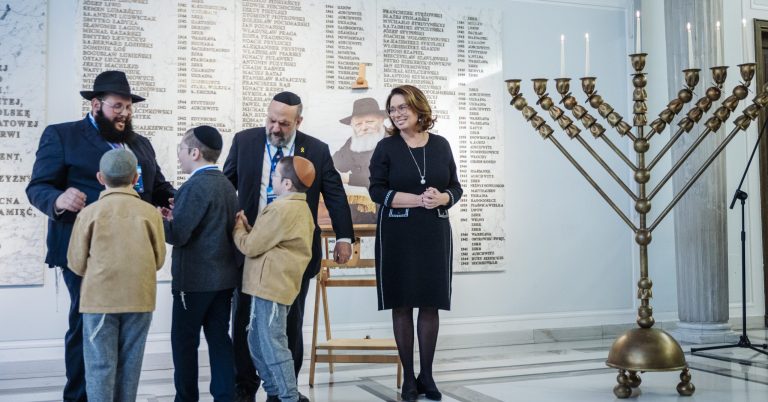 Polish parliament celebrates Hanukkah amid far-right protest outside